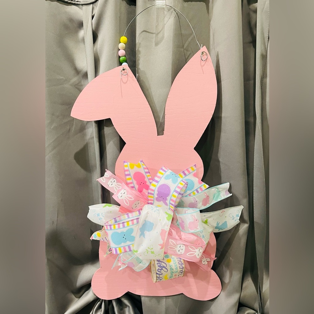 23.5" X 12.75"  Easter Wreath. Please note bow will flatten during shipping.